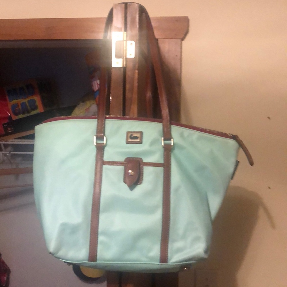 Gently used Dooney Bourke. Smoke free home. Small stain on bottom.